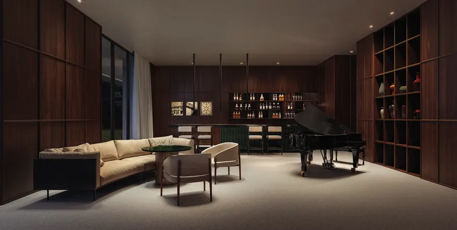 Piano Bar do RIIO by Piero Lissoni com sofás e estante de madeira