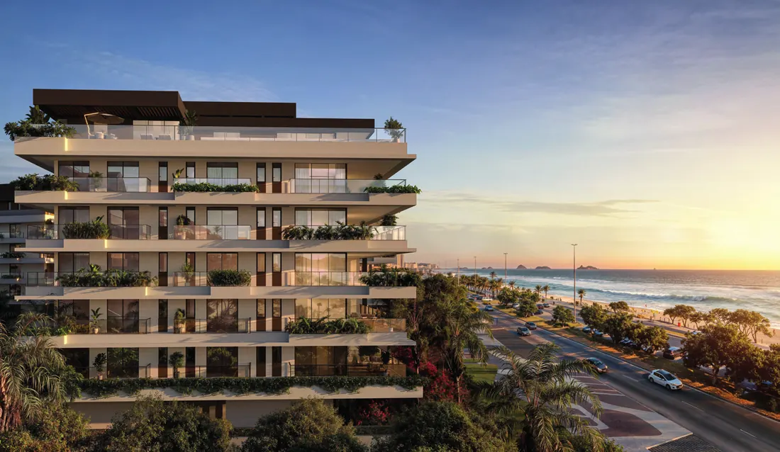 Fachada lateral do RIIO by Piero Lissoni com varandas e jardineiras de frente para o mar da Barra da Tijuca